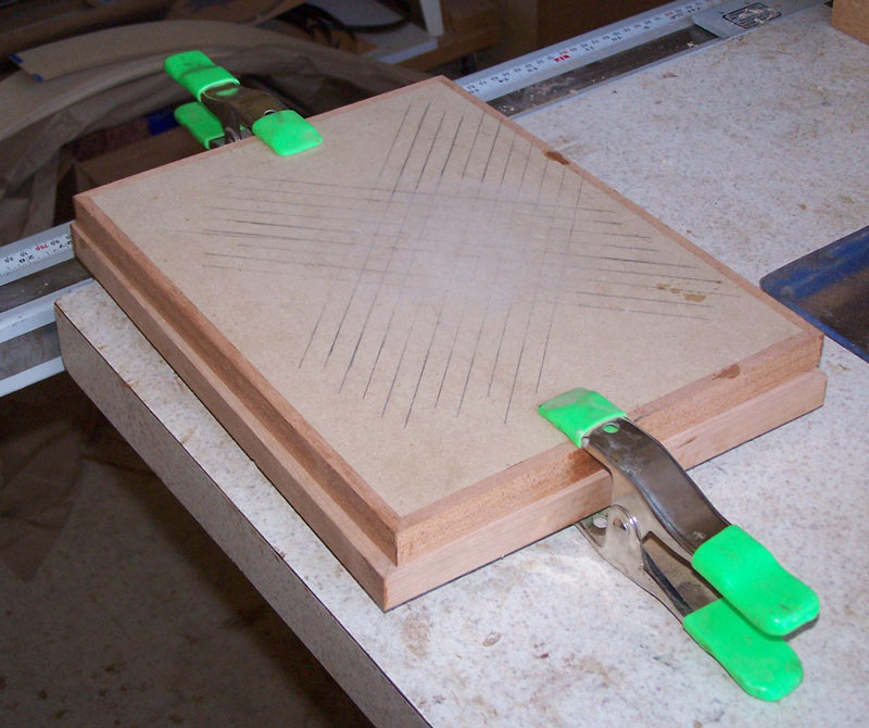 Presssing the rose while drying the veneer tape