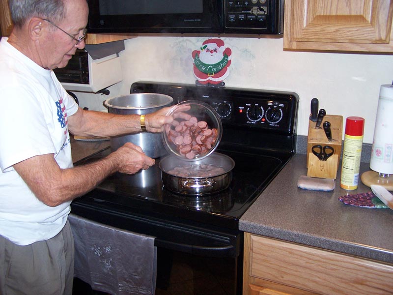 Put the andouille and sausage into the gumbo